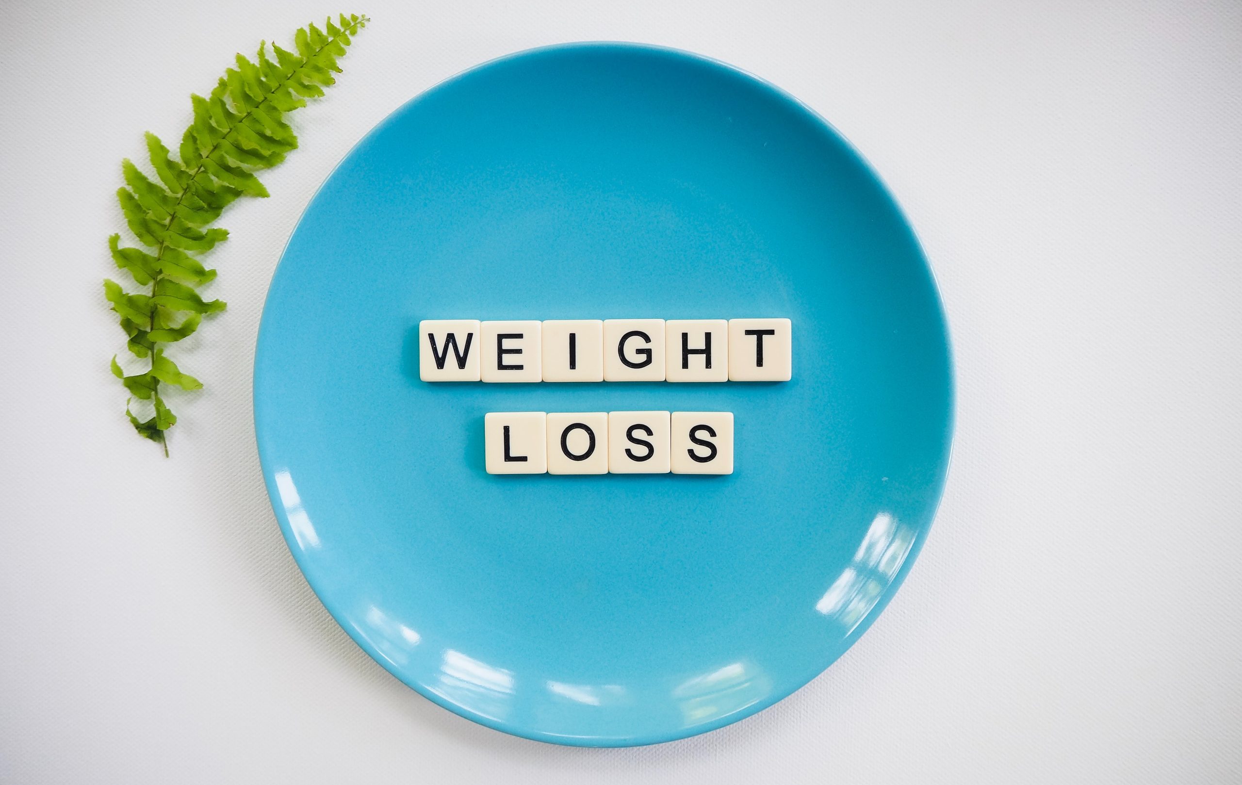 BLUE bowl with weight loss written on it