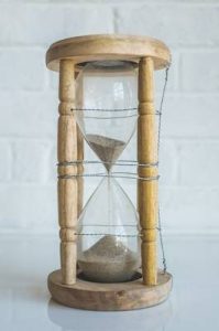 sand timer in wooden frame